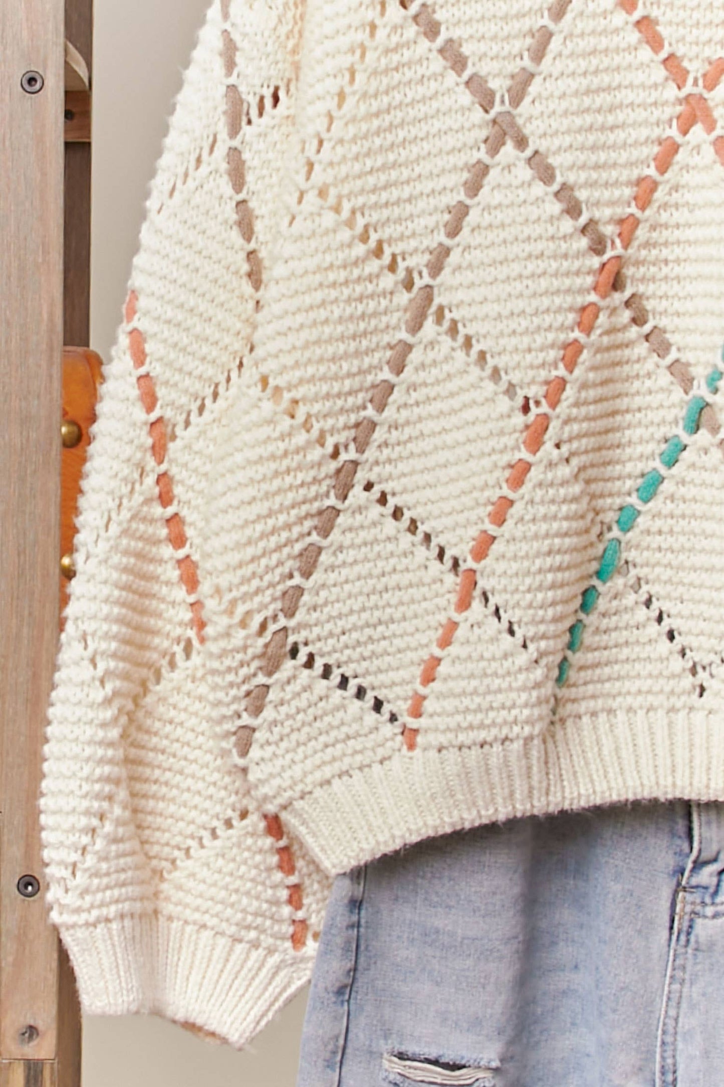 DIAMOND CUTOUT KNIT SWEATER