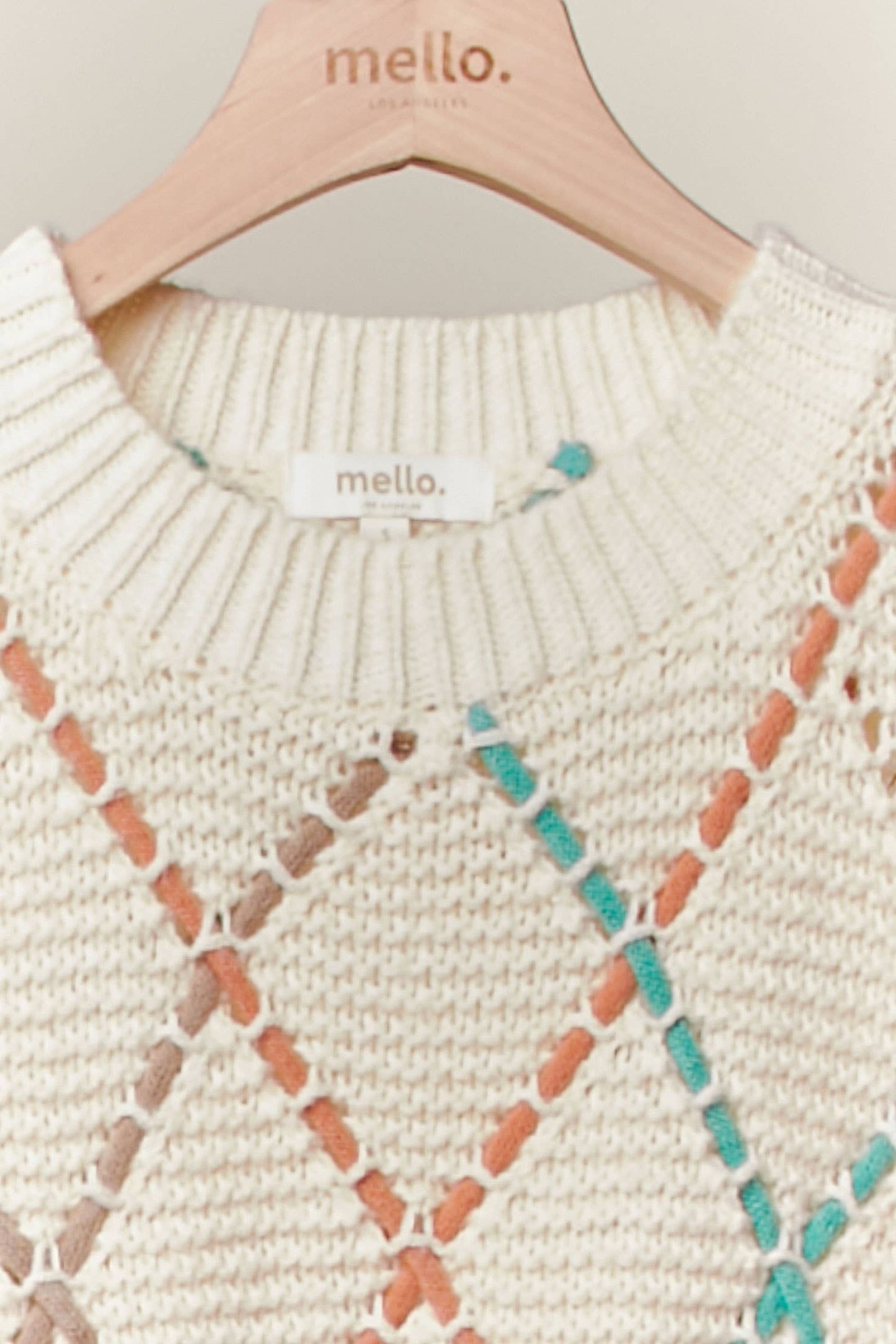 DIAMOND CUTOUT KNIT SWEATER