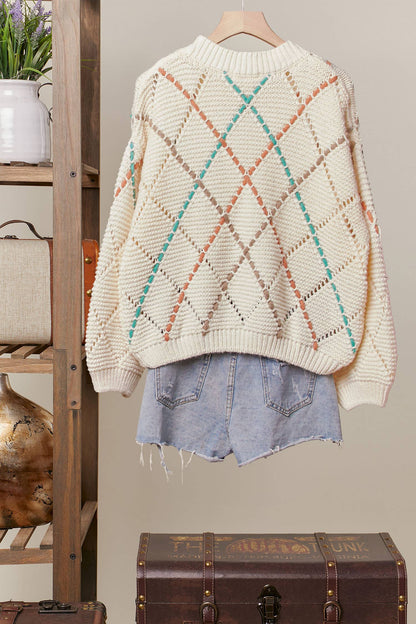 DIAMOND CUTOUT KNIT SWEATER