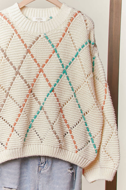 DIAMOND CUTOUT KNIT SWEATER