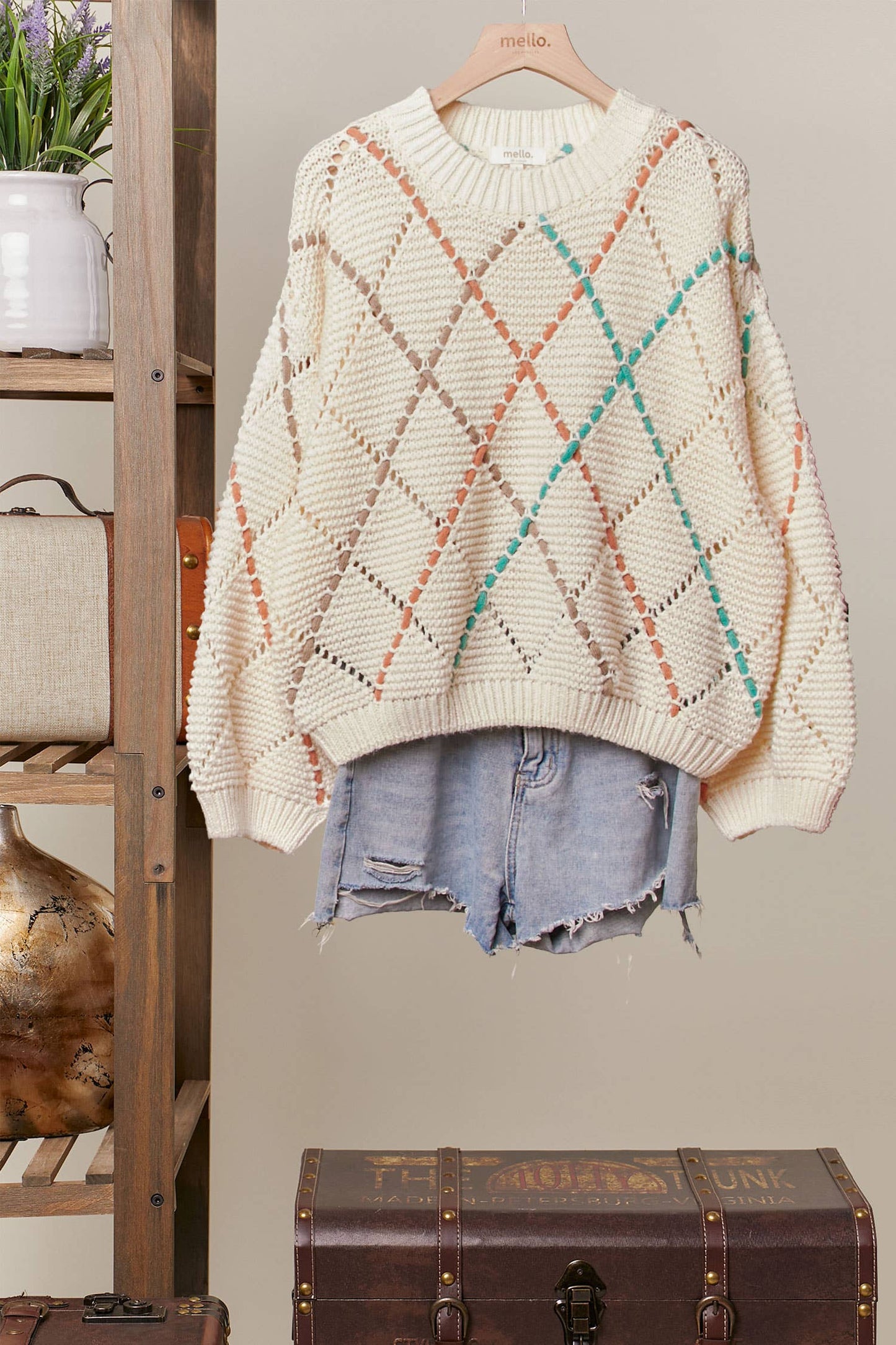 DIAMOND CUTOUT KNIT SWEATER